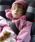 Sleeping kid in a car seat